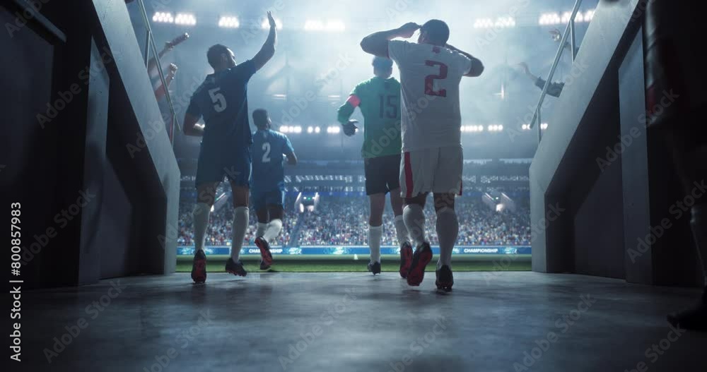 Tunnel Walk with Teams of European Football Players Entering a Sold Out Soccer Arena Before a Championship Match. Footballers are Welcomed Like Heroes by International Soccer Fans