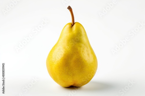 One yellow pear close-up on a white background.