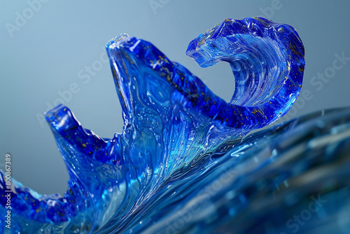A vibrant wave of lapis blue, merging into a transparent, glass-like texture that reflects the deep and majestic blue of lapis lazuli, captured in photo