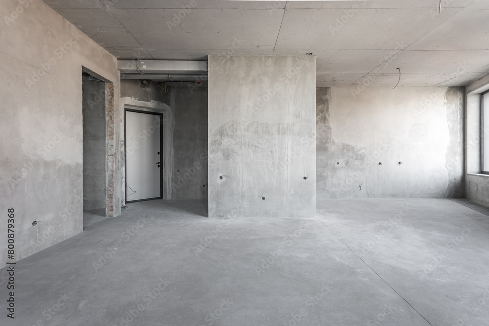 interior of the apartment without decoration in gray colors. rough finish interior of the apartment without decoration in gray colors. rough finish