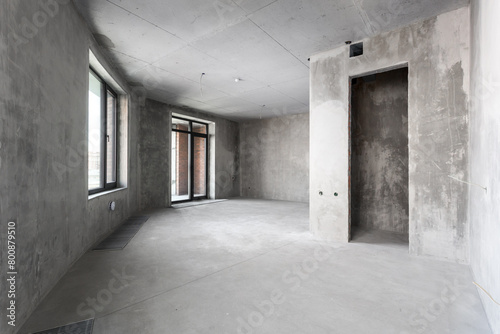 interior of the apartment without decoration in gray colors. rough finish