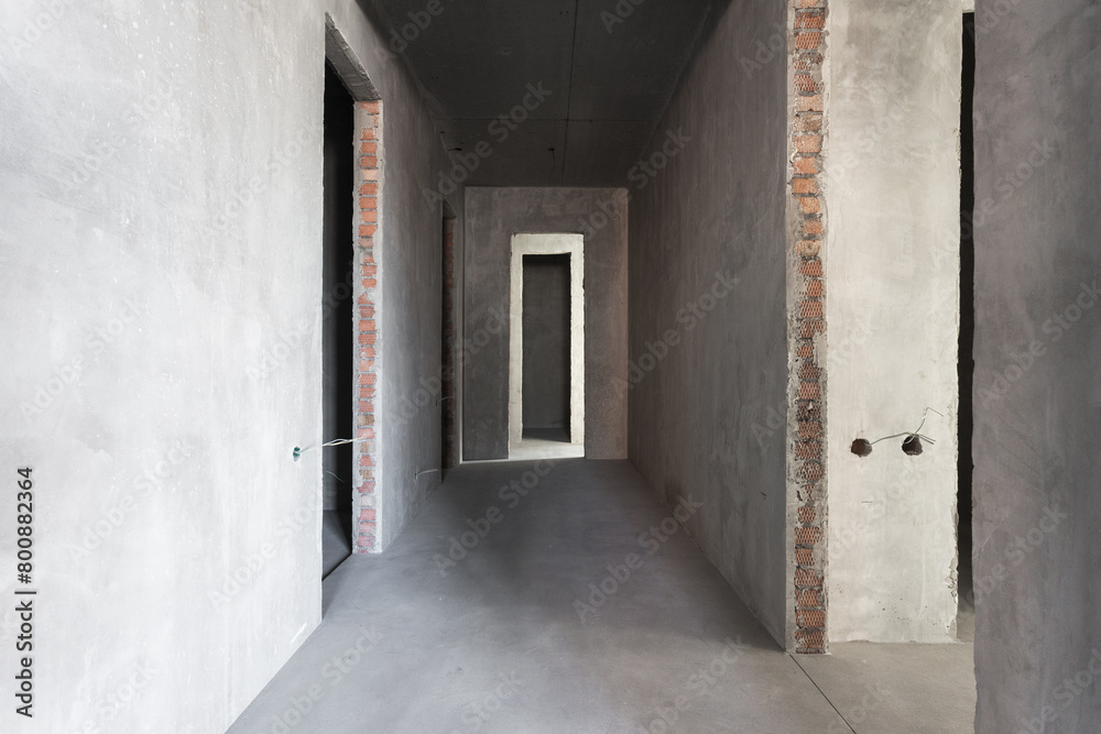 interior of the apartment without decoration in gray colors. rough finish