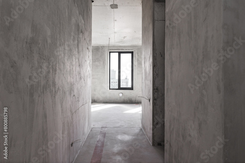 interior of the apartment without decoration in gray colors. rough finish