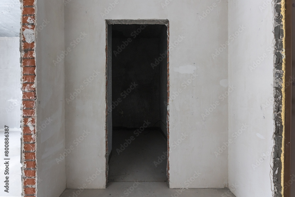 interior of the apartment without decoration in gray colors. rough finish interior of the apartment without decoration in gray colors. rough finish