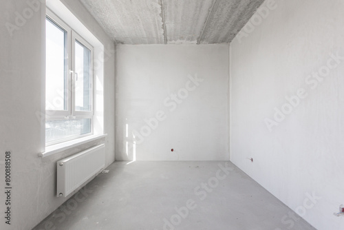 interior of the apartment without decoration in gray colors. rough finish