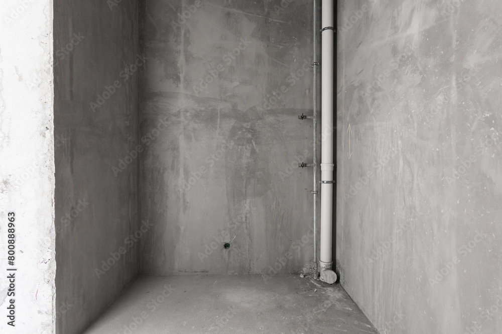 interior of the apartment without decoration in gray colors. rough finish interior of the apartment without decoration in gray colors. rough finish