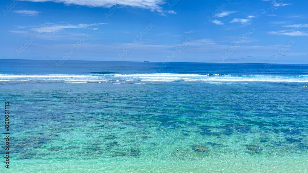 beautiful beach with blue sky and white clouds