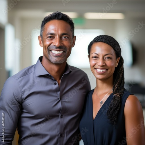 Smiling man and woman of African descent