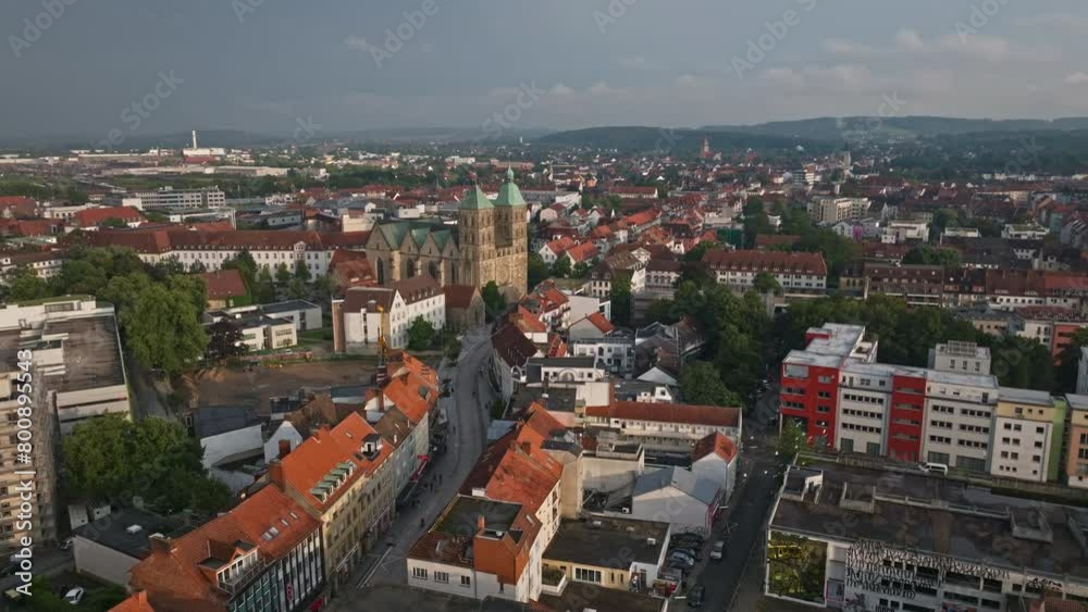 Aerial drone view of Osnabrück's Innenstadt in Germany. The old town center is known for its colorful gabled houses and centuries-old buildings. Aerial drone view of Osnabrück's Innenstadt in Germany. The old town center is known for its colorful gabled houses and centuries-old buildings.