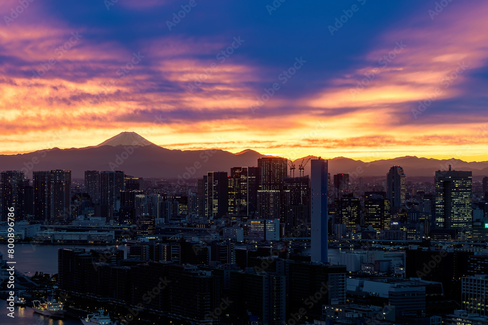 Fototapeta premium View of Mount Fuji from Tokyo, Japan at sunset with rare Mountain Shadow