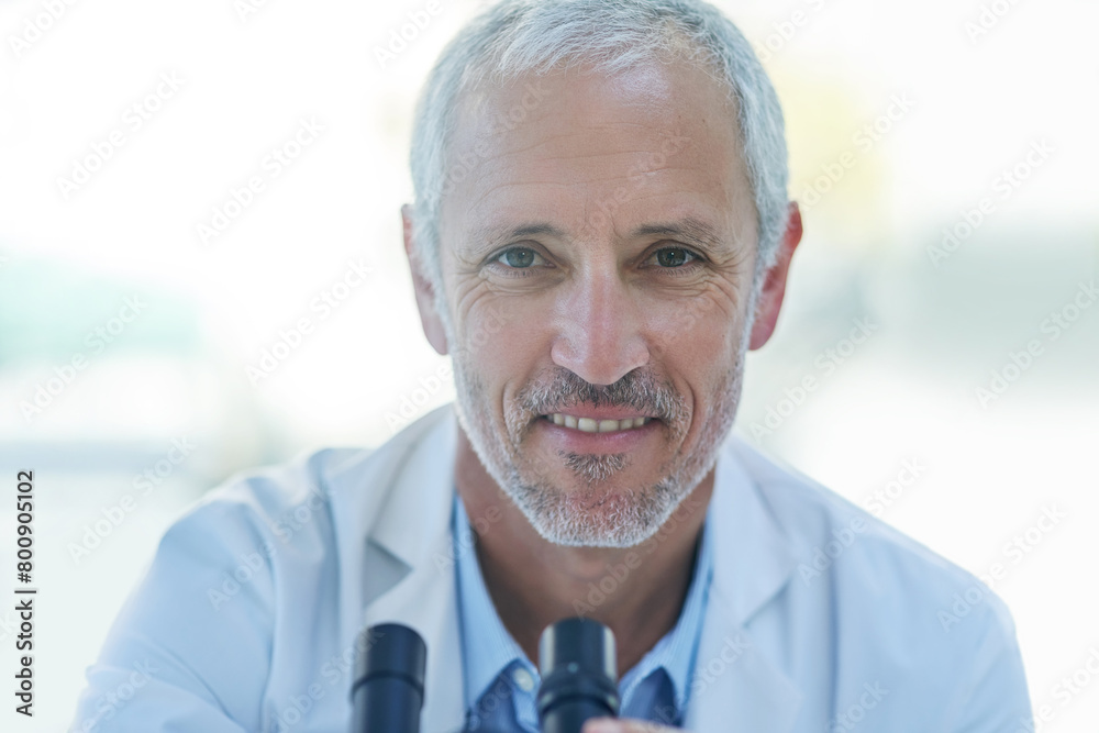 Science, microscope and portrait mature man in lab for biotech engineering, innovation and research. Laboratory, test and scientist checking sample for pharmaceutical development in medical study. Science, microscope and portrait mature man in lab for biotech engineering, innovation and research. Laboratory, test and scientist checking sample for pharmaceutical development in medical study.