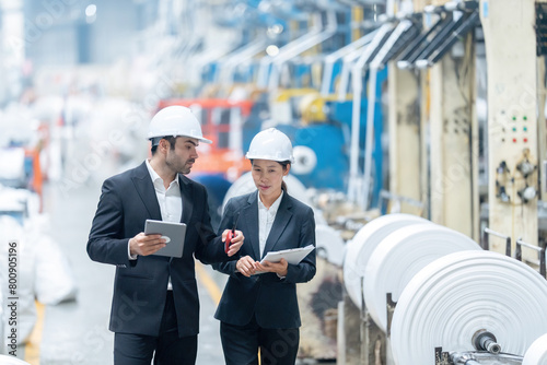 Fotografi Gender diversity in leadership positions within the industrial factory promotes fairness and equity, ensuring that the voices of both male and female engineers are heard and respected