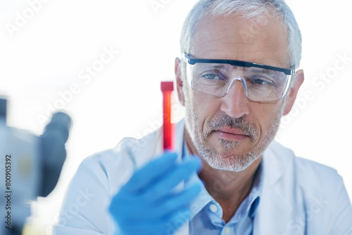Science  blood and mature man with test tube for biotech engineering  pathology and hematology research. Laboratory  investigation and scientist checking diabetes drugs development for medical study