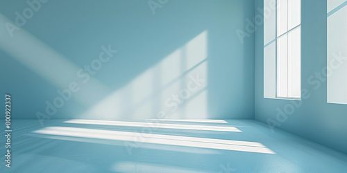 empty room with blue wall and floor with sunlight  from the window. Interior background for the presentation. empty blue room