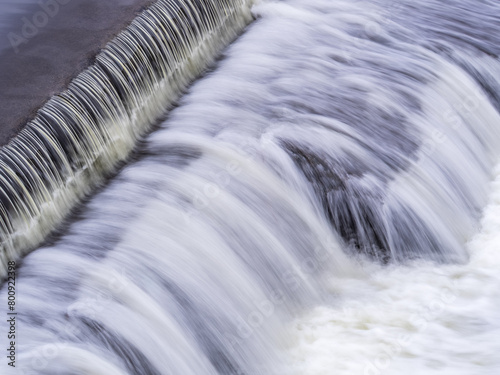 A small flat cascade in a calm river