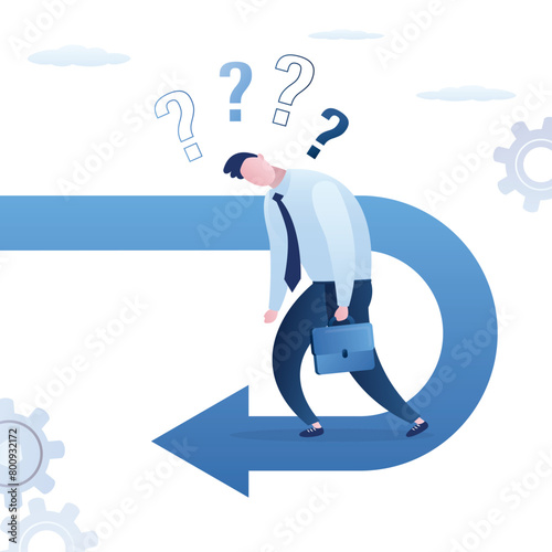 Frustrated businessman looking at his reverse direction pathway. Business mistake, failure. Business turning point, break event, change direction, reverse back,