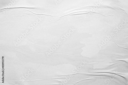 white crumpled and creased glued wrinkled paper poster texture background photo