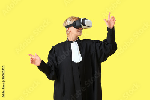 Mature female judge using V...