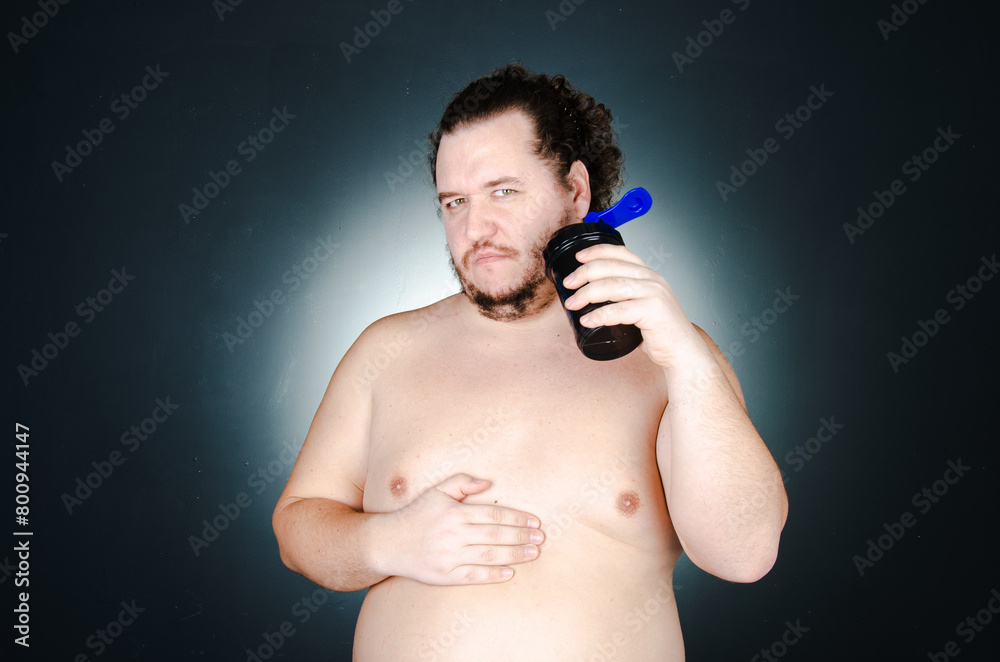 Fototapeta premium Funny fat man on a diet.