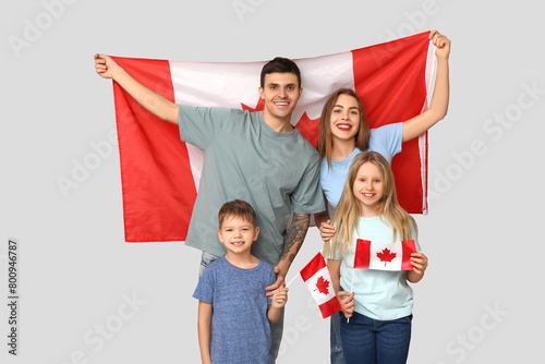 Happy family with flags of ...