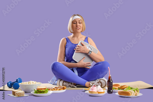Worried sporty woman with w...