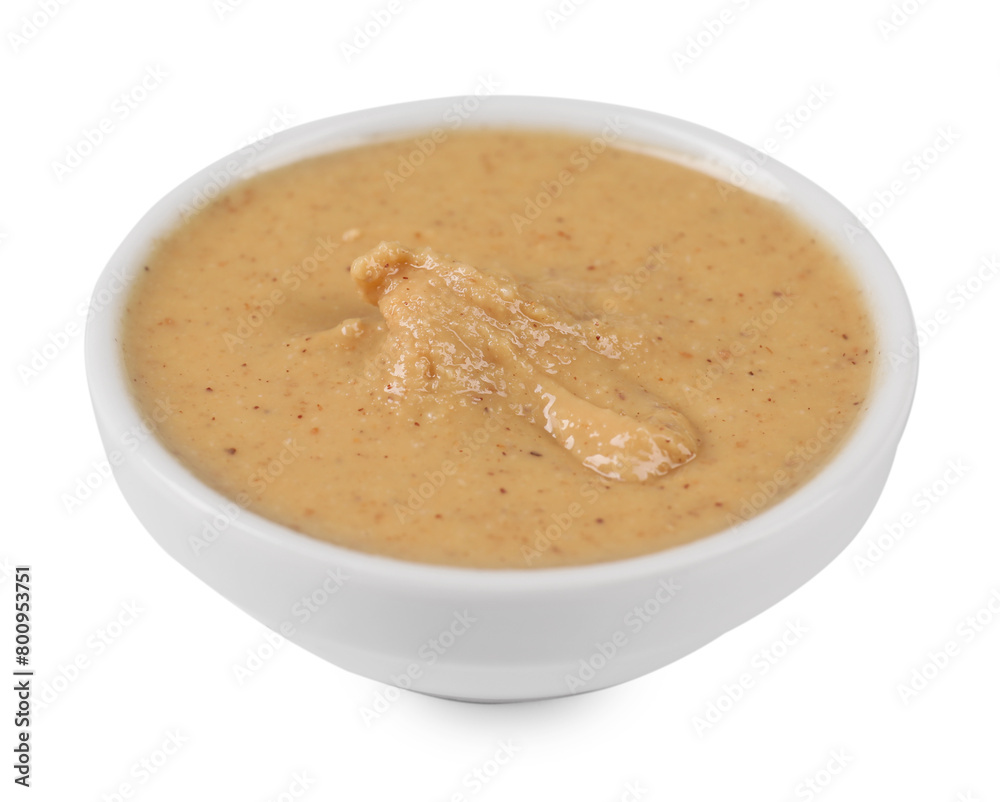 Delicious nut butter in bowl isolated on white Delicious nut butter in bowl isolated on white