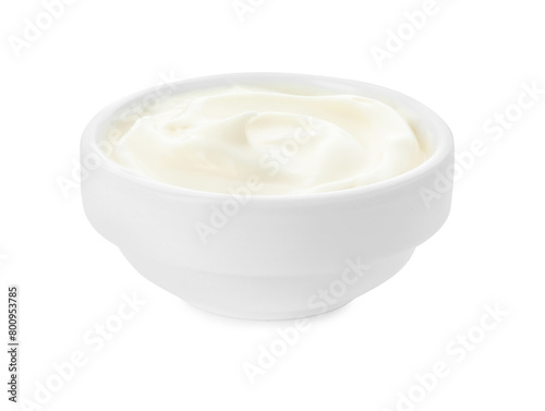 Tasty fresh mayonnaise sauce in bowl isolated on white