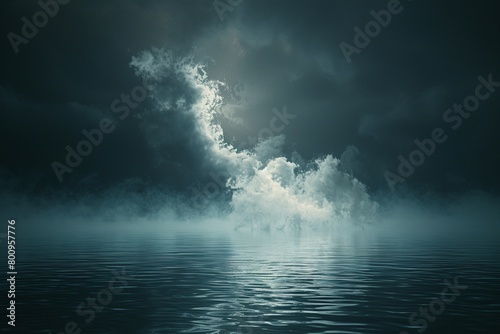 Black and white photo: Ethereal clouds and mist, suggestive of a holy presence, dance above the darkness of a mysterious body of water.