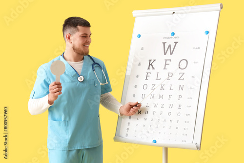 Male ophthalmologist with o...