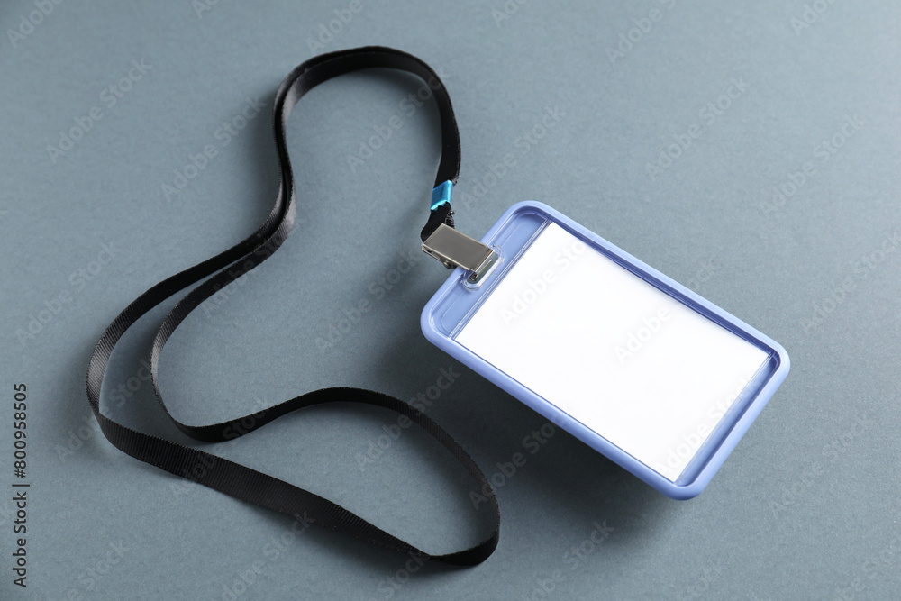 Blank badge with string on grey background Blank badge with string on grey background