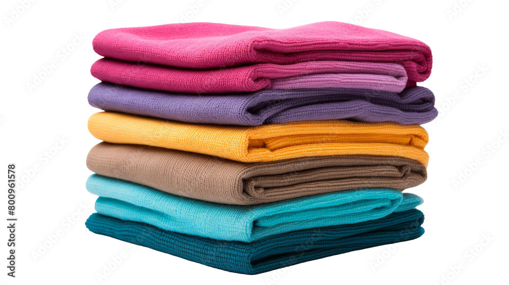 A neat stack of folded towels in various colors, resting on a pristine white background A neat stack of folded towels in various colors, resting on a pristine white background