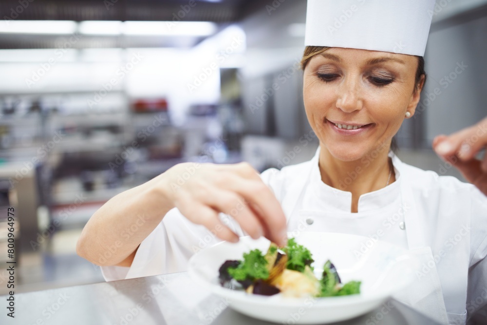 Cooking, food and chef in restaurant with dish presentation for lunch, fine dining and dinner. Kitchen, serving and woman with seasoning, plating and ingredients for culinary, cuisine and catering Cooking, food and chef in restaurant with dish presentation for lunch, fine dining and dinner. Kitchen, serving and woman with seasoning, plating and ingredients for culinary, cuisine and catering