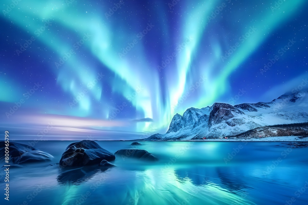 Aurora borealis on the Lofoten islands, Norway, Night sky with polar lights, Night winter landscape with aurora and reflection on the water surface
