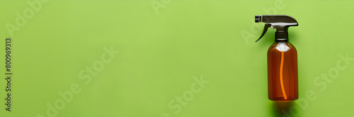 Bug spray bottle web banner. Bug spray bottle isolated on green background with copy space.