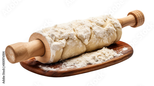 A rolling pin filled with dough rolling out on top of a wooden board