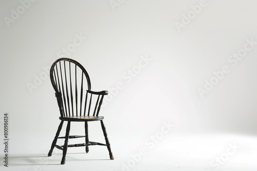 Elegant Windsor chair featured on a clean white backdrop.