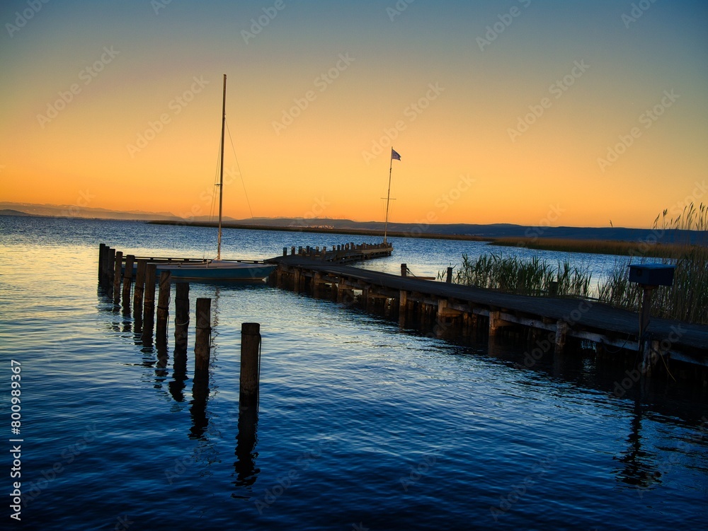Sunrise at Lake Neusiedl in Austria, Europe's largest steppe lake and a UNESCO World Heritage Site Sunrise at Lake Neusiedl in Austria, Europe's largest steppe lake and a UNESCO World Heritage Site
