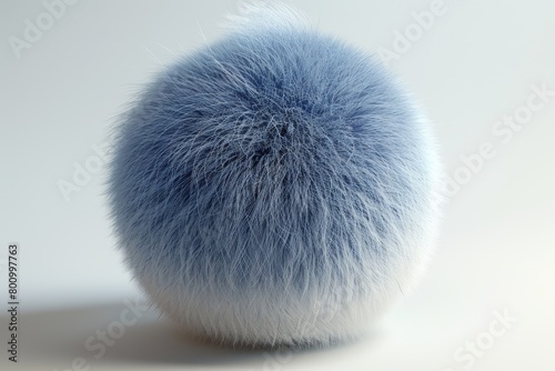 esfera de tejido de peluche. fondo azul. abstracto photo