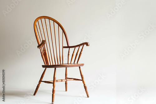 Stylish Windsor chair captured with a clean white background.