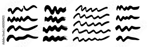 Set of black wavy grunge brush strokes