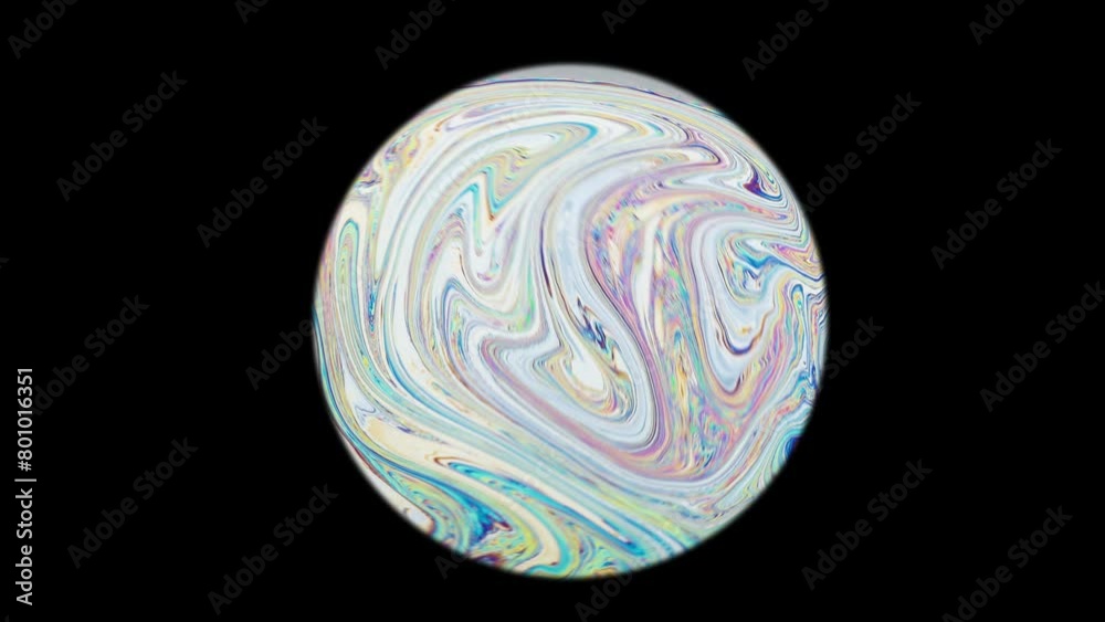 Soap bubble and its beautiful iris shimmers in different colors. Reminds me of the planets of the solar system. Soap bubble and its beautiful iris shimmers in different colors. Reminds me of the planets of the solar system.