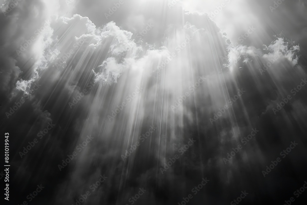 A cascade of sunbeams piercing through a cloudy veil.