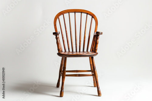 Traditional Windsor chair showcased on a solid white backdrop.