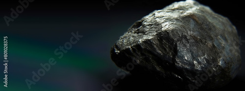 Calaverite fossil mineral stone. Geological crystalline fossil. Dark background close-up. photo
