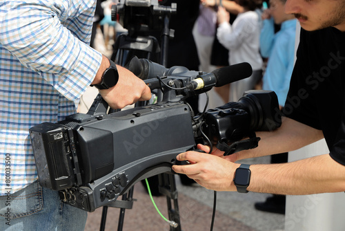 video camera with  lens used for a live news broadcast.  Professional Studio Camera Lens