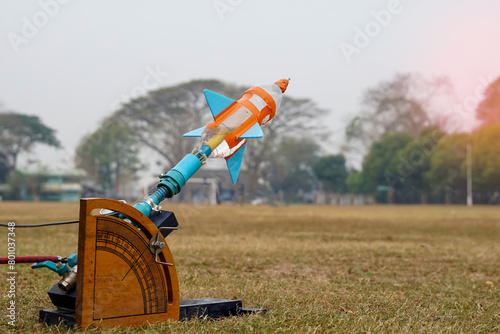 water rocket on launch pad. It is an activity that promotes science knowledge and skills for children. Children have thinking skills, problem-solving, creativity, happiness, and fun.