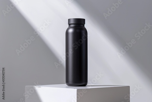 A matte black stainless steel sport tumbler bottle emanates understated elegance