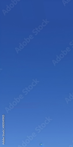 A blue sky with no clouds. The sky is very clear and bright