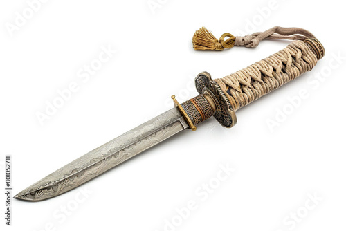 Samurai-inspired battle dagger with a traditional folded steel blade, wrapped in silk cord, and a tsuba decorated with intricate motifs isolated on solid white background. photo