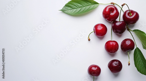 Red sweet cherries on white background photo